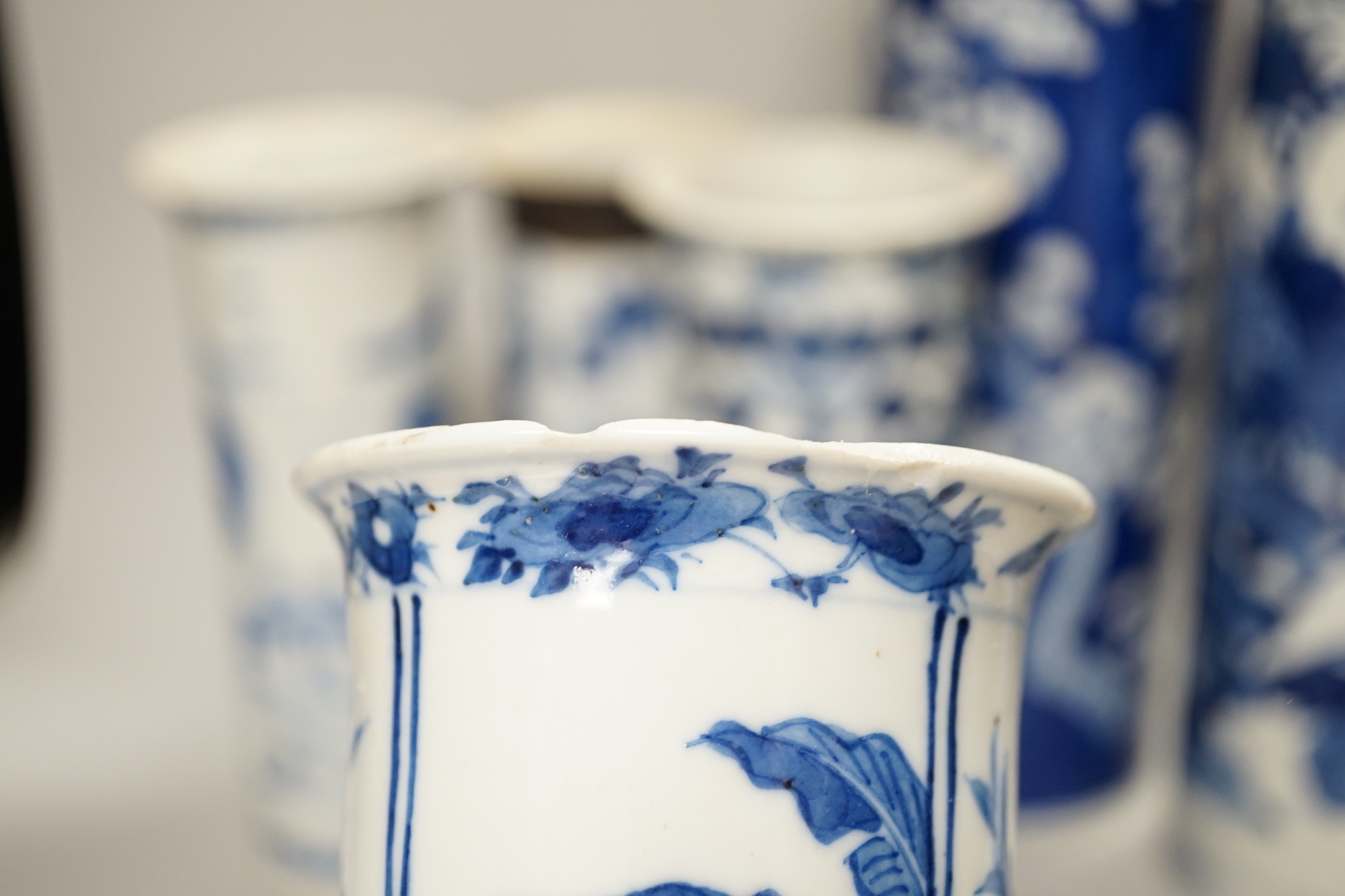 Nine assorted Chinese blue and white cylinder vases, 19th/20th century, tallest 30cm high (a.f.)